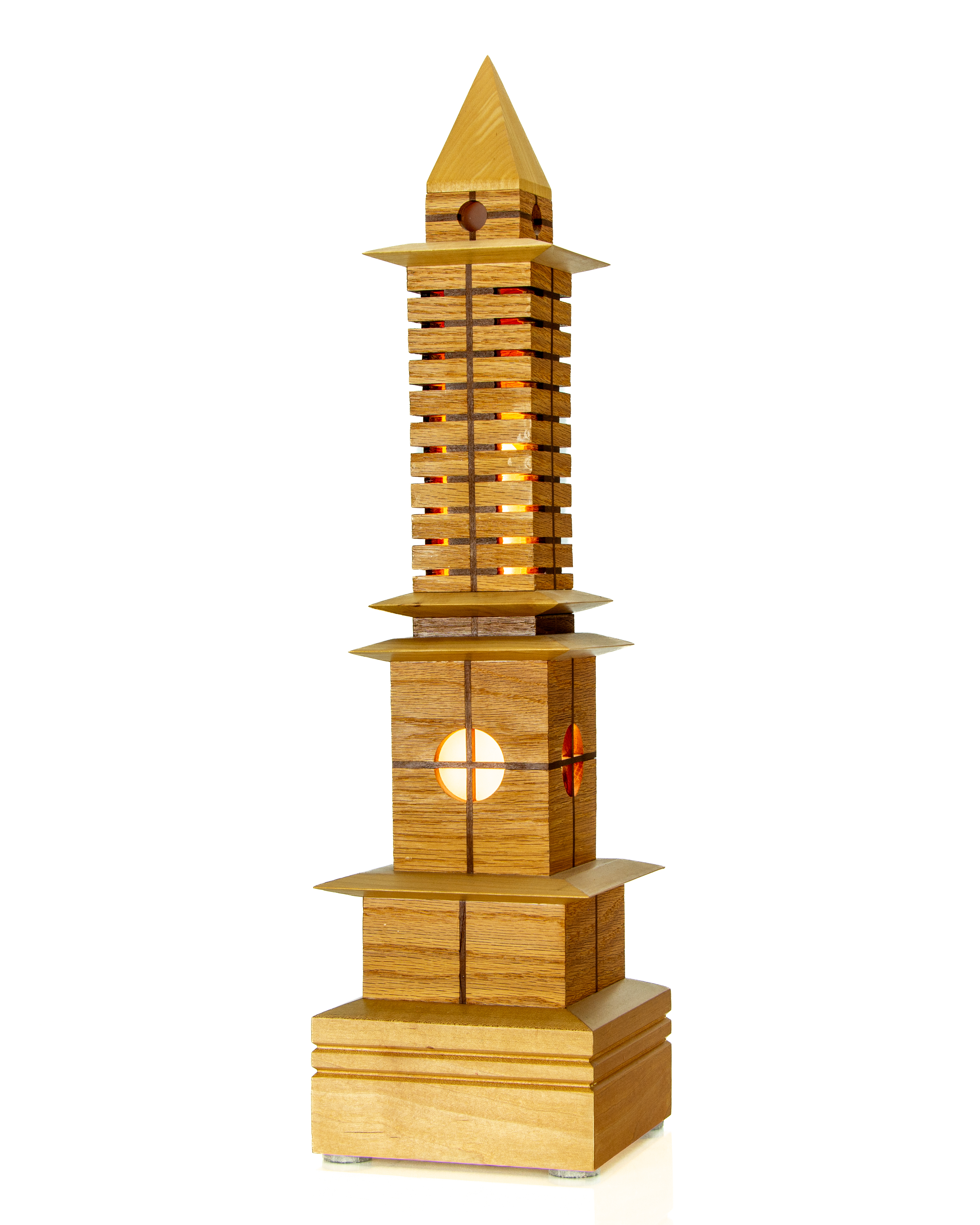 Prairie Beacon — tall architectural lantern with circular mullioned windows, slatted shaft, and pyramid finial